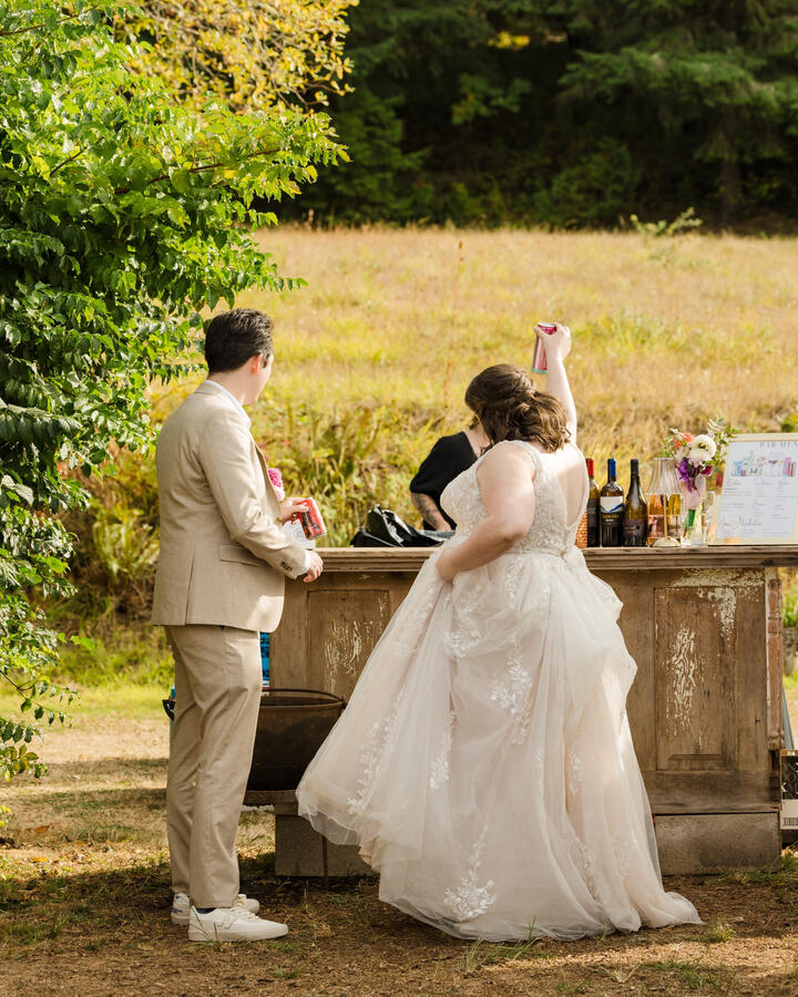 Untitled Friendly bartender from Simple Bar pouring drinks for guests at a private event.